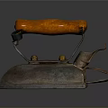 Vintage Household Iron With Wooden Handle And Retro Metal Design
