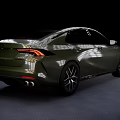 Olive Green Sporty Sedan With Sleek Body Modern Headlights And Alloy Wheels