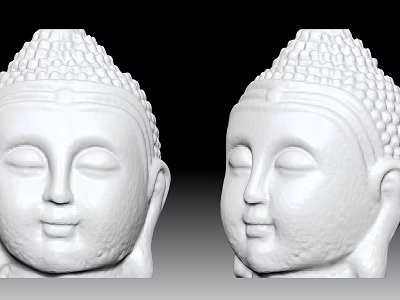 Two White Buddha Head Sculptures With Smooth Carved Facial Features 3d model