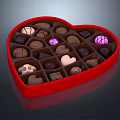 Heart Shaped Box Filled With Assorted Delicious Chocolates Of Different Shapes