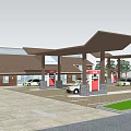 Gas Station Exterior Featuring Fuel Pumps Canopy Building And Parked Cars With Trees