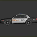 White and Black Police Car With Red Blue Emergency Lights And POLICE Badge