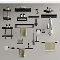 Black Bathroom Accessories With Shelves Towels Bottles Hooks And Toilet Paper Holder On Light Wall