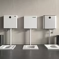 Three White Toilets With Wall Mounted Cisterns Black Trash Bins Against Gray Wall Dark Floor