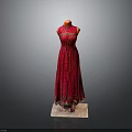 Red Polka Dot Long Dress On Mannequin With Ruffled Hem And Fitted Waist