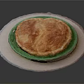 Delicious Baked Pie With Golden Crust Served On Green Plate And White Base