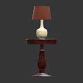 Classic Wooden Side Table Featuring Round Top Carved Leg And Brown Lampshade