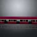 Red Train Car Model with Multiple Windows and Doors on Gray Background with Reflection