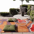 Cozy Outdoor Patio With White Metal Rocker Chair Table Green Plants Colorful Rug And Cushions