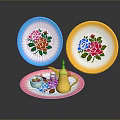 Colorful Household Items Including Blue Yellow Plates And Golden Teapot On Pink Tray