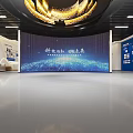Innovative Exhibition Space With Large LED Screen And Golden Circular Lighting Design