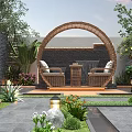 Courtyard Garden With Circular Wicker Arch Wicker Seating And Table Lush Greenery And Colorful Flowers