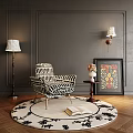Black White Striped Accent Chair With Metal Legs Round Rug Floor Lamp And Decorative Artwork
