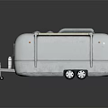 Vintage Silver Travel Trailer With Metal Exterior Window Wheels And Support Stand