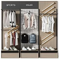 Men's Sports Apparel Display With Various Clothes Backpacks And Shoes On Racks