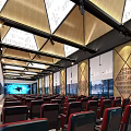 Modern Theater Auditorium Interior With Arranged Red Black Seats Geometric Ceiling And Wall Art