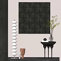 Modern Geometric Wall Decor in Minimalist Hallway with Spiral Vase and Green Plant