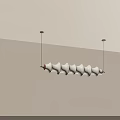 Elegant Wavy Cream Fabric Chandelier Suspended From Ceiling With Black Rods