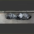 Black Sporty Motorcycle With Racing Design On Platform Against Gray Background
