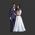 Couple In Formal Blue Suit And White Gown Pose Together
