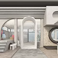 Modern Cafe Exterior Featuring Arched Doorways Stone Wall Round Window Steps And White Chairs