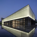 Contemporary Modern Building With Skylight Roof Glass Facade And Greenery
