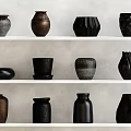 Ceramic Vessels Display With Various Shapes Textures And Neutral Colors On Shelves