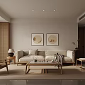 Modern Minimalist Living Room Interior With Beige Sofa Circular Artworks And Wooden Coffee Table