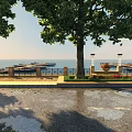 Scenic Waterfront Landscape With Large Trees Lamp Posts Flower Beds Paved Walkway And Distant Dock
