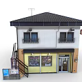 Two Story Commercial Building With Yellow Storefront Brown White Exterior Glass Windows And Metal Staircase