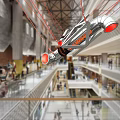 Modern Metallic Pendant Chandelier with Red Accents in Multi Level Shopping Mall Atrium