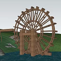Garden Ornament With Wooden Waterwheel Grass Water Surface And Sunset Light