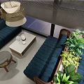 Modern Café Interior Design With Green Plants Blue Banquette And Woven Pendant Lights