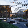 Tranquil Residential Landscape With Wooden Lattice Structures Lush Green Shrubs And Stone Pathway