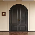Arched Black Paneled Double Doors With Golden Handles And Light Colored Walls