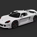White Sports Car With Sleek Aerodynamic Body And Black Alloy Wheels