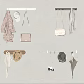Stylish Clothes Hanging on Wall with Accessories Bags Hats Scarf and Camera