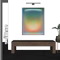Abstract Painting with Soft Gradient Colors in Modern Interior With Wooden Bench And Plant