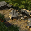 Traditional Thatched Roof Huts In Outdoor Leisure Area With Trees Tables Umbrellas And People