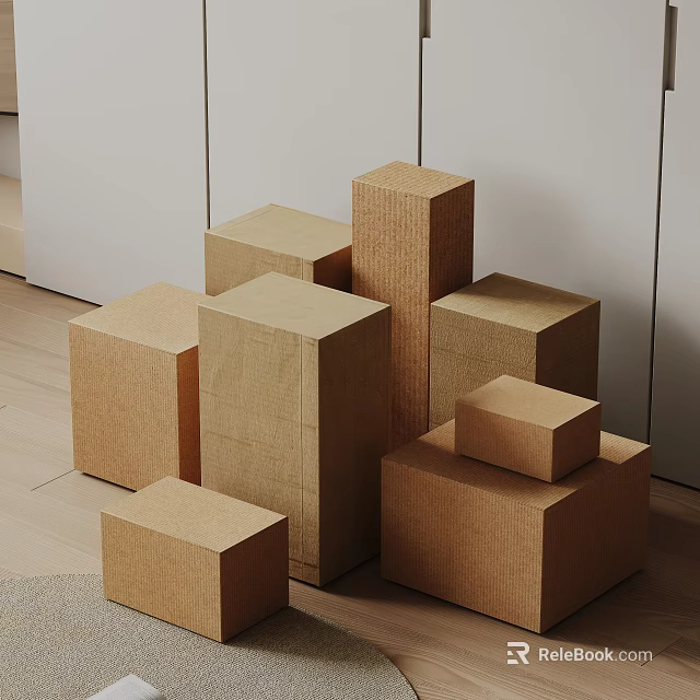 Cardboard Boxes of Various Sizes Arranged in Indoor Setting With Wooden Floor and White Walls 3d model 