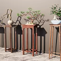 Four Wooden Plant Stands With Bonsai And Decorative Plants Against Gray Wall