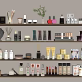 Assorted Perfumes and Cosmetics Shelf Display With Various Bottles Jars and Makeup Items
