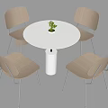 Modern Negotiation Table And Chairs With Round White Tabletop Light Seats Metal Legs Green Plant