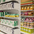 Well Organized Retail Display Shelves With Multi tiered Racks Holding Packaged Cereals Canned Goods And Boxed Products