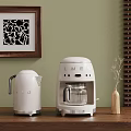 White SMEG Electric Kettle Coffee Machine On Wooden Counter With Green Wall Art And Blinds