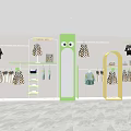 Kids Clothing Store Interior With Green Cartoon Mirror Yellow Display Racks And Hanging Clothes
