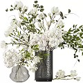 Elegant Vase Arrangement With White Hydrangea Magnolia Flowers And Fresh Green Leaves