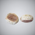 Freshly Baked Artisan Bread Loaves With Crusty Surface And Golden Brown Color