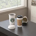 Starbucks Beverage Cups Placed On Dark Table With Lids And Tipped Cup 3d model