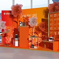 Luxury Life Themed Display With Red Backdrop And Orange White Decorative Flowers